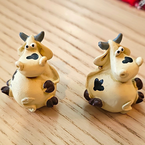 Pair freestanding cow - of,